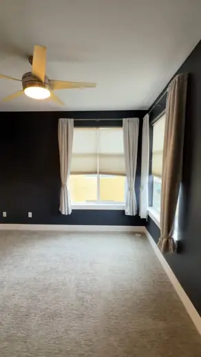 Bedroom with dark navy walls and carpet, Elements Painting project on the Colorado Front Range