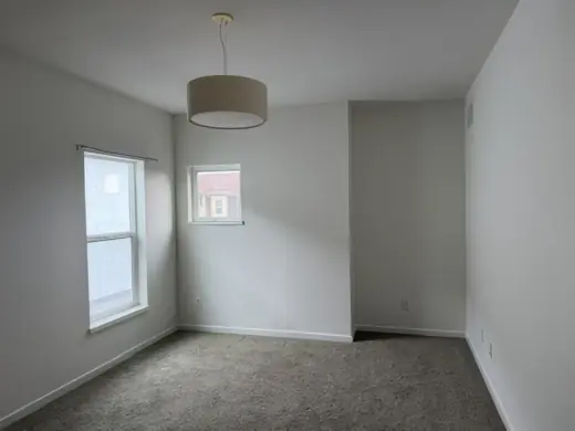 Bedroom with light gray walls and carpet, Elements Painting project on the Colorado Front Range