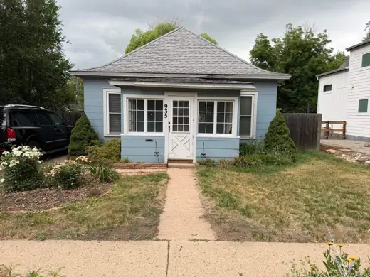 Blue cottage with white windows, front sidewalk, Elements Painting project on the Colorado Front Range