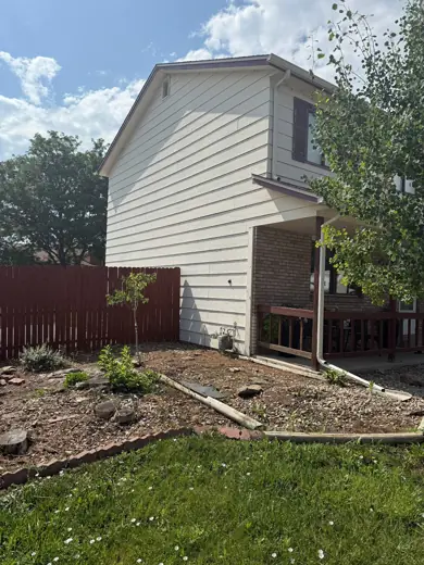 Cream sided house side with brown trim, Elements Painting project on the Colorado Front Range