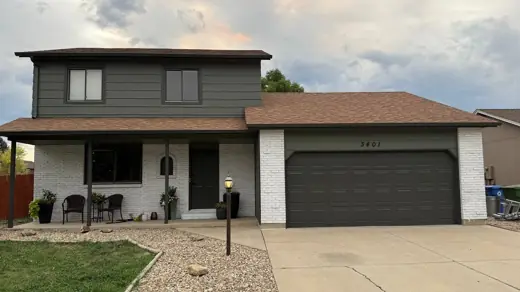 Dark gray home with brown roof and black garage, Elements Painting project on the Colorado Front Range