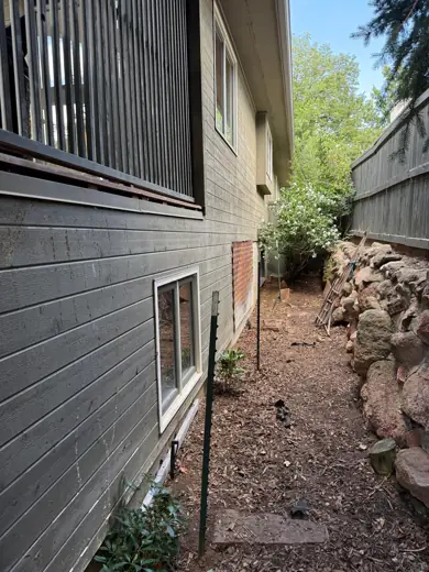 Dark gray house side with brown trim, before painting, Elements Painting project on the Colorado Front Range