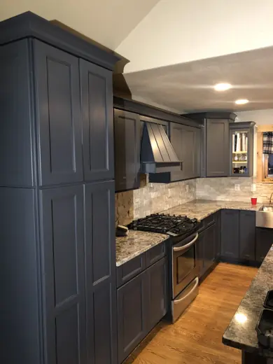 Dark gray painted kitchen cabinets with wood floors, Elements Painting project on the Colorado Front Range