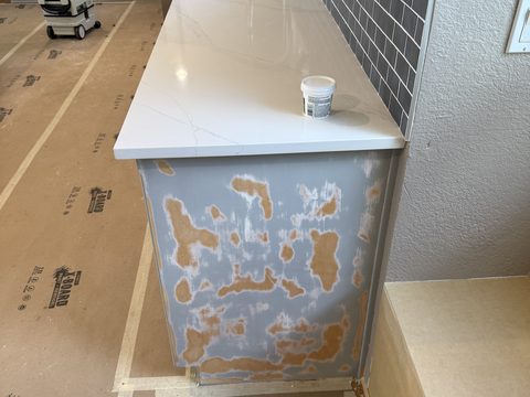 In progress: Island end panel sanded, filler on counter, Elements Painting project on the Colorado Front Range