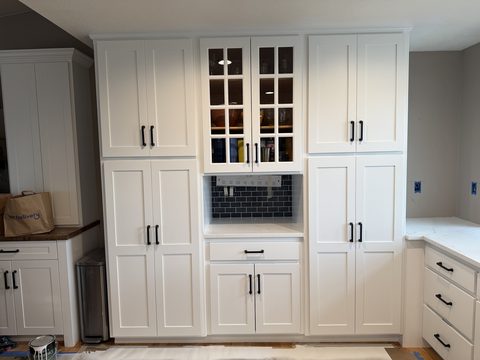 Cabinet painting, white shaker pantry wall, glass centre cabinet, Elements Painting project on the Colorado Front Range
