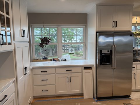 Cabinet painting, white cabinets and fridge wall, Elements Painting project on the Colorado Front Range