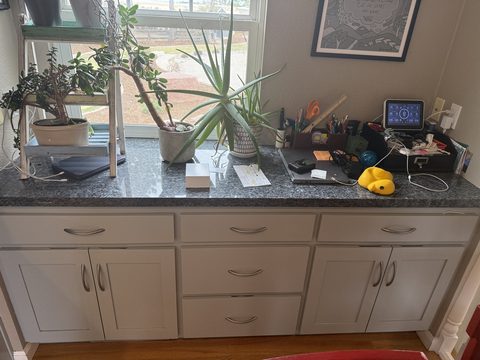 Cabinet painting, light grey lower cabinets with granite top, kitchen, Elements Painting project on the Colorado Front Range