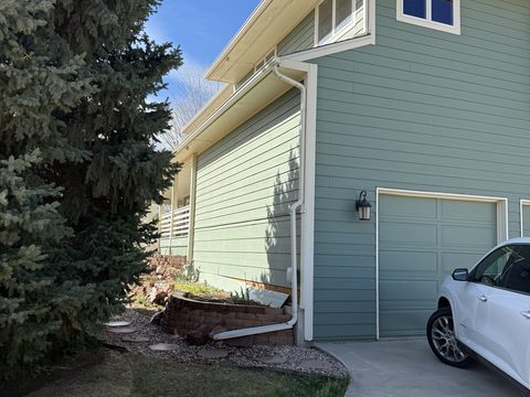 Exterior painting, sage green siding and garage corner, Elements Painting project on the Colorado Front Range