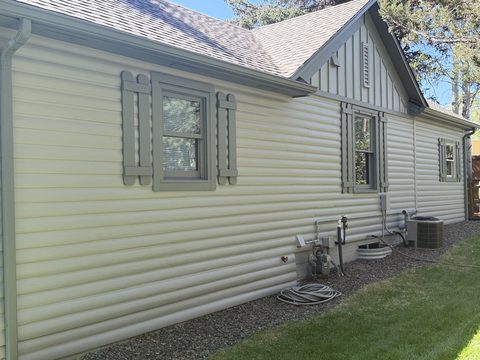 Exterior painting, cream lap siding, sage shutters, Elements Painting project on the Colorado Front Range
