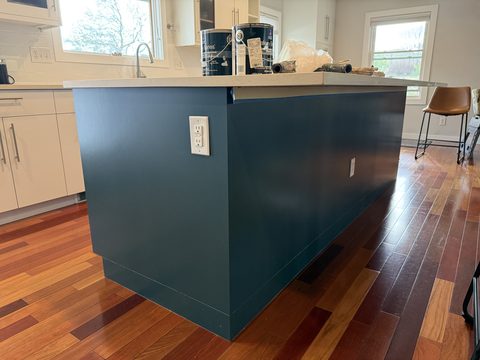 Cabinet painting, dark teal island end panel, white perimeter cabinets, Elements Painting project on the Colorado Front Range