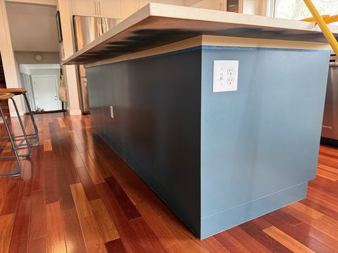Cabinet painting, blue-grey island side panel, hardwood floor, kitchen, Elements Painting project on the Colorado Front Range