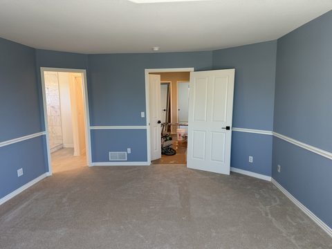 Interior painting, blue-grey bedroom, white chair rail, doors, Elements Painting project on the Colorado Front Range