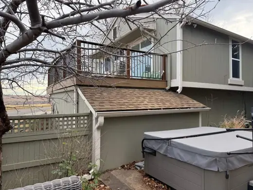 Gray-green house side with deck and hot tub, Elements Painting project on the Colorado Front Range