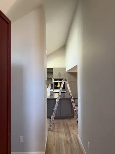 Hallway with ladder during interior painting prep, Elements Painting project on the Colorado Front Range