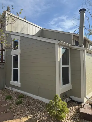 Sage green upper story with cream trim and chimney, Elements Painting project on the Colorado Front Range