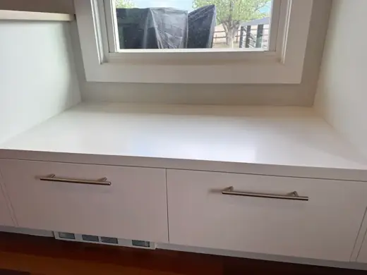 White flat-panel cabinets with white countertop, Elements Painting project on the Colorado Front Range