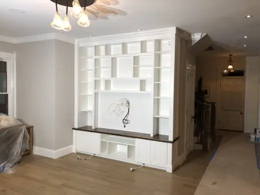 White painted built-in shelving unit with drop cloth prep, Elements Painting project on the Colorado Front Range