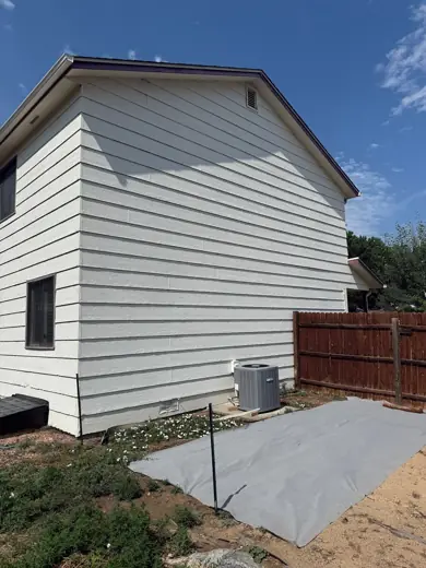 White sided house rear before painting, brown roof, Elements Painting project on the Colorado Front Range